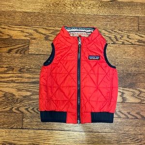 Previously loved reversible Patagonia vest. Size 12-18 months.